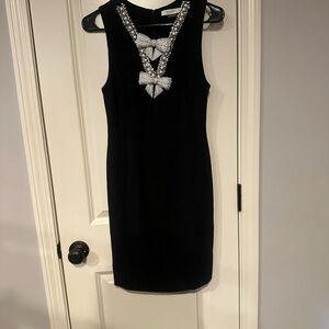 Elegant Black Dress with Embellished Details